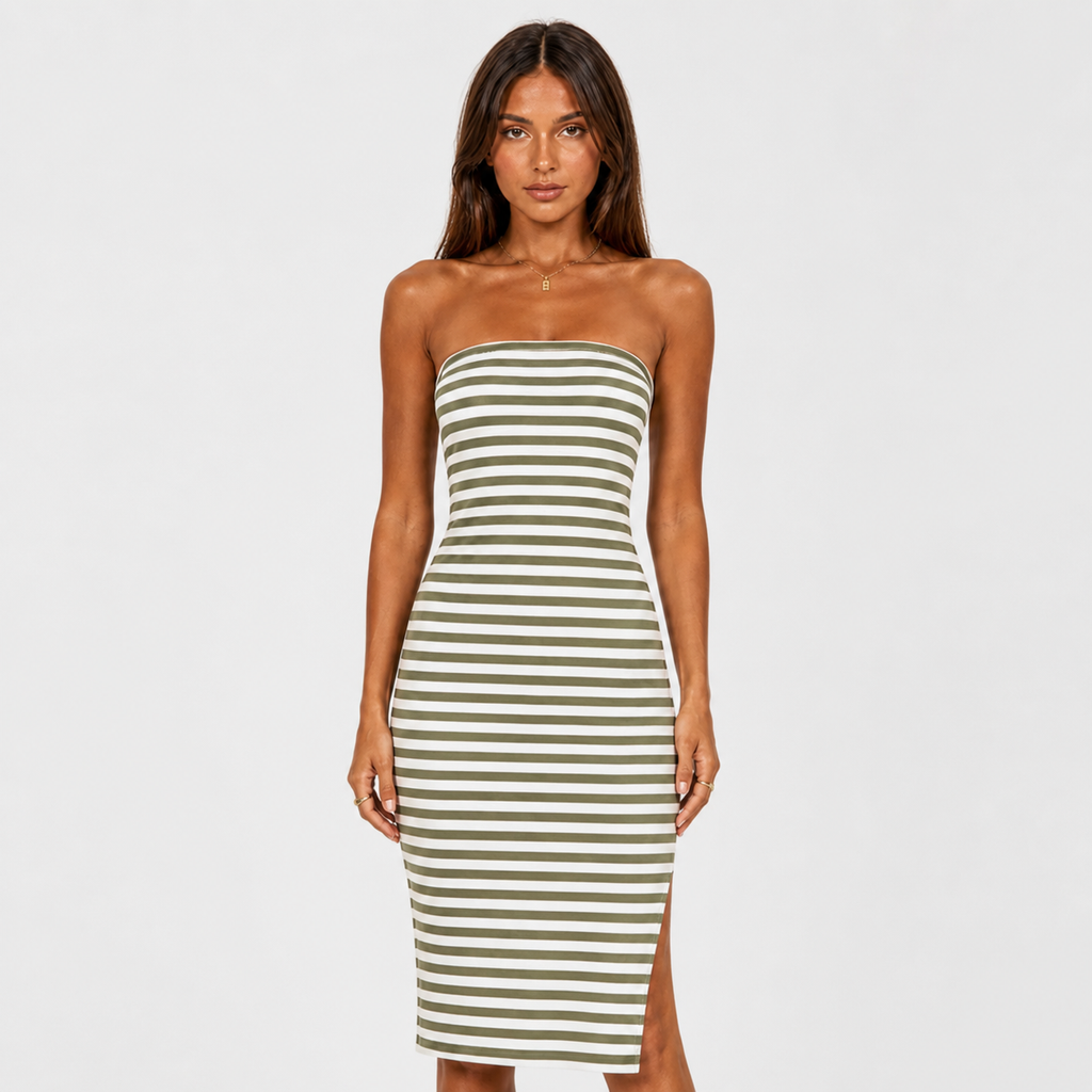 Woman wearing a strapless striped dress on a white background